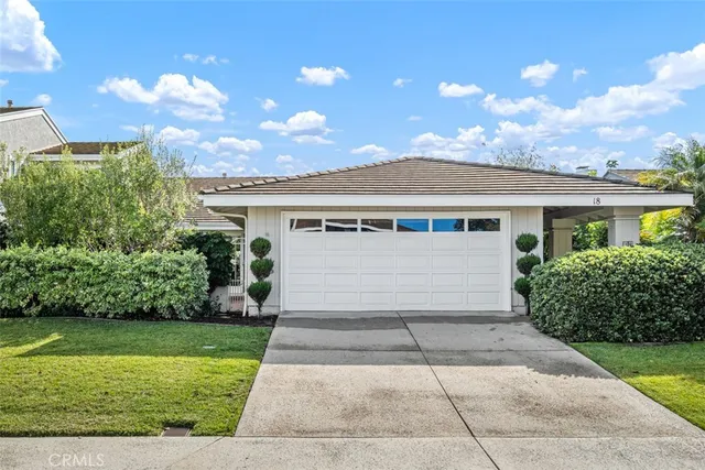 a view of house with yard