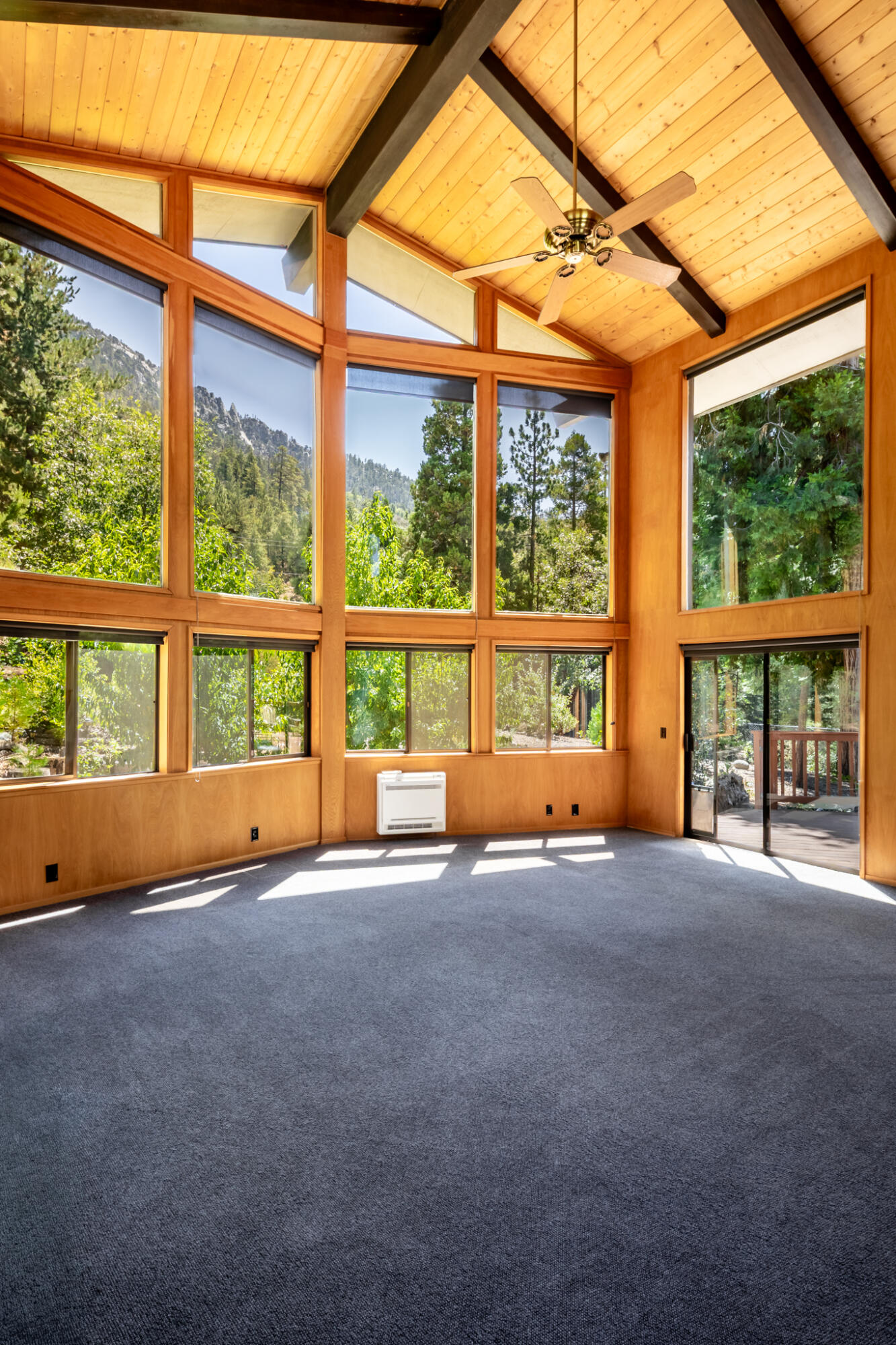 24752 Fern Valley Road Idyllwild, CA 92549 - Photo 14 of 35 a view of an empty room with a large window