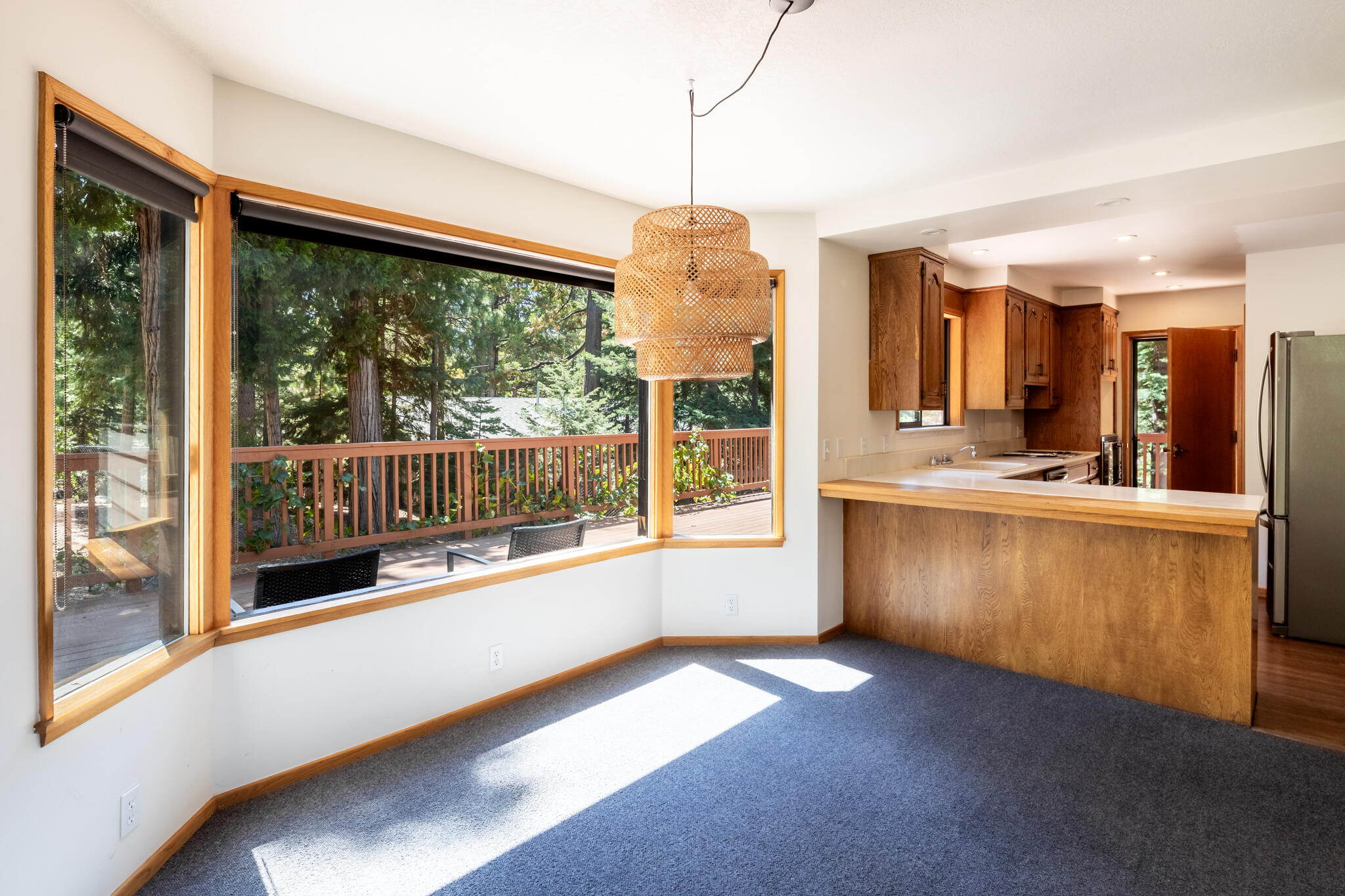 24752 Fern Valley Road Idyllwild, CA 92549 - Photo 16 of 35 a view of a kitchen with a large window