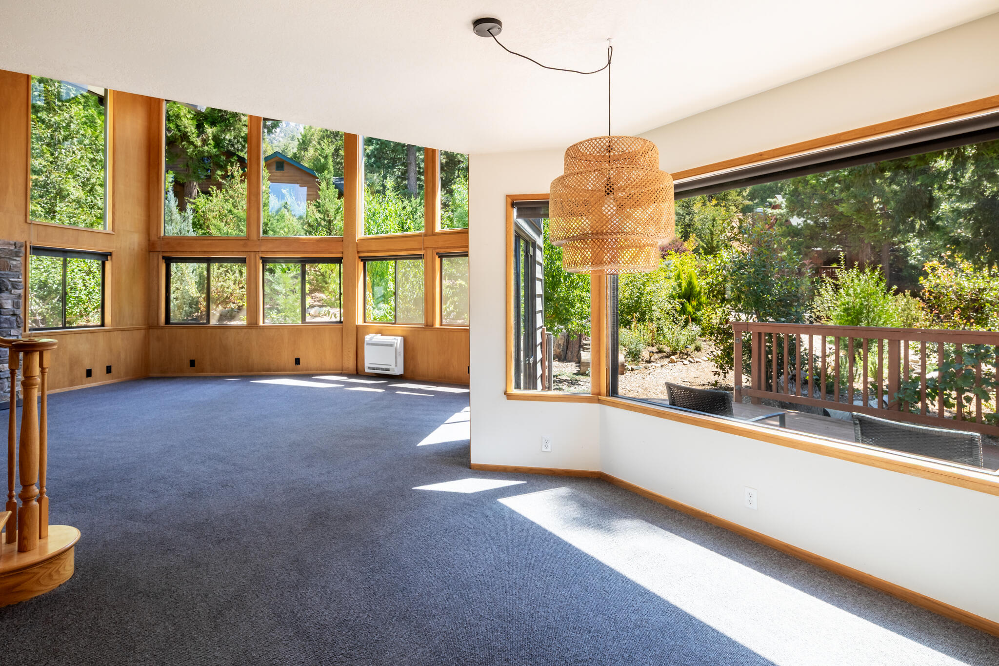 24752 Fern Valley Road Idyllwild, CA 92549 - Photo 17 of 35 a view of an empty room with wooden floor and a window
