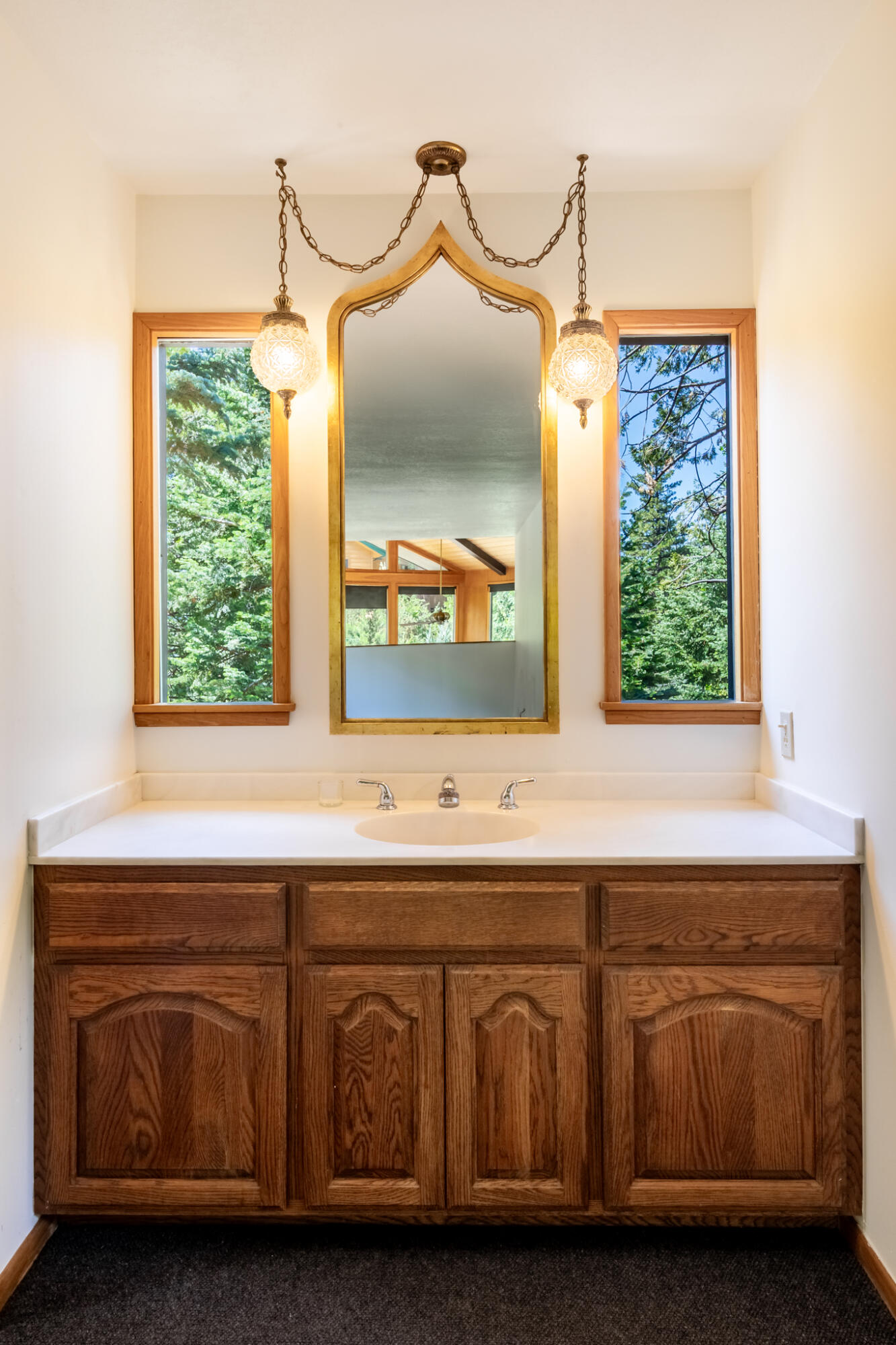24752 Fern Valley Road Idyllwild, CA 92549 - Photo 25 of 35 a bathroom with a sink and a mirror