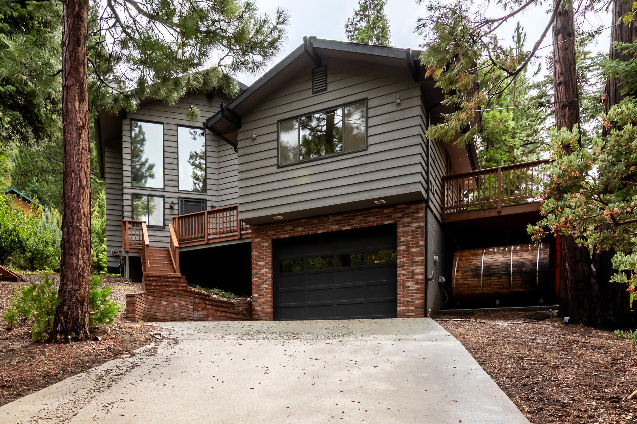 24752 Fern Valley Road Idyllwild, CA 92549 - Photo 4 of 35 a front view of a house with a tree