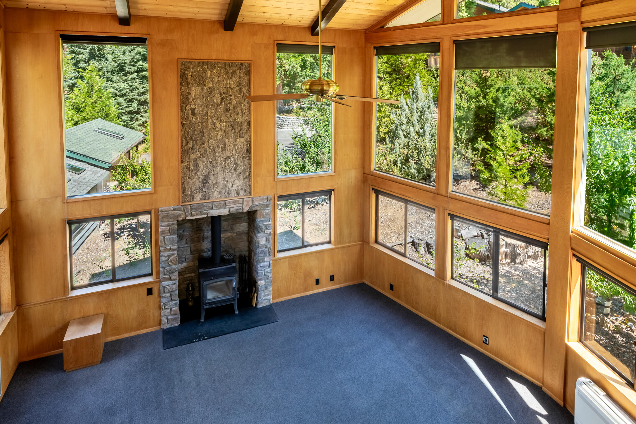 24752 Fern Valley Road Idyllwild, CA 92549 - Photo 8 of 35 a view of an entryway with wooden floor and windows