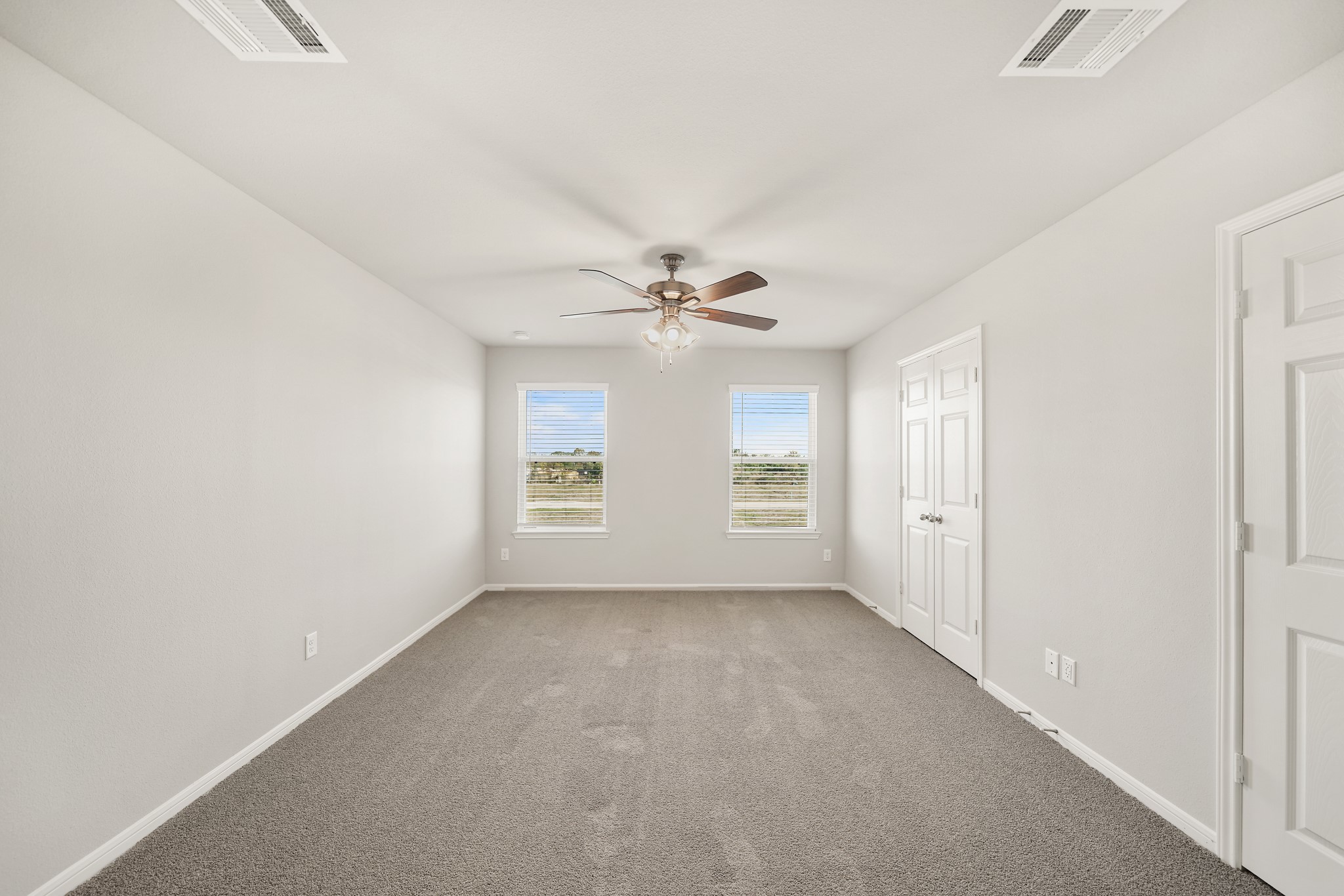13313 Talisker Road Houston, TX 77048 - Photo 5 of 11 a view of an empty room with a window
