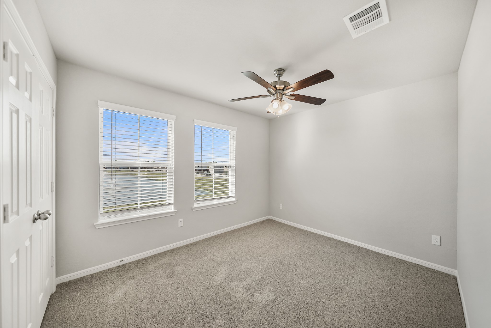 13313 Talisker Road Houston, TX 77048 - Photo 9 of 11 an empty room with a window