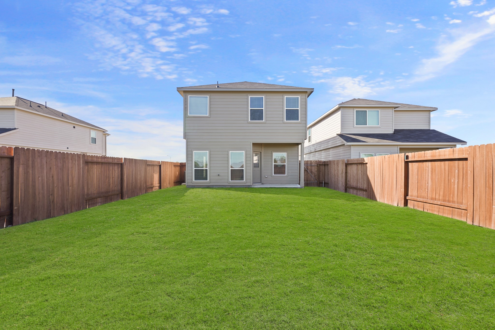 13313 Talisker Road Houston, TX 77048 - Photo 10 of 11 a view of a house with a backyard