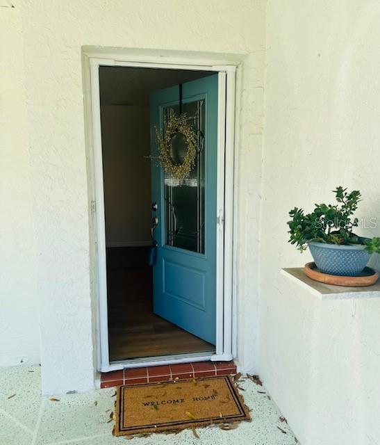 2033 Hawkhurst Circle, Unit 180 Sun City Center, FL 33573 - Photo 2 of 19 a view of an entryway door