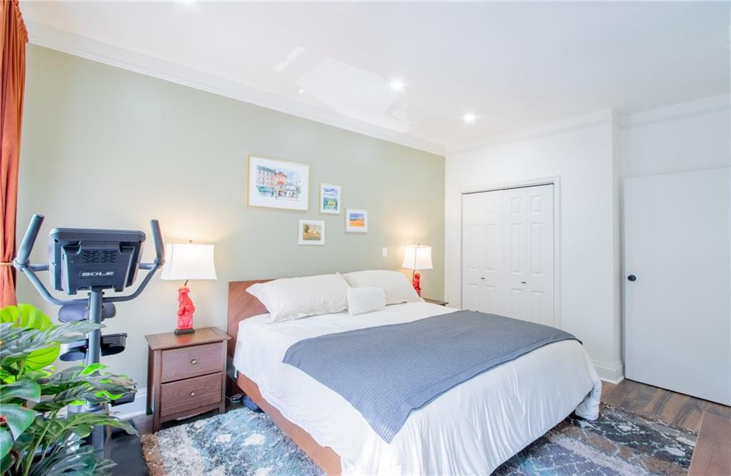 10104 4th Avenue, Unit 2B Brooklyn, NY 11209 - Photo 13 of 27 a bedroom with bed and a couch