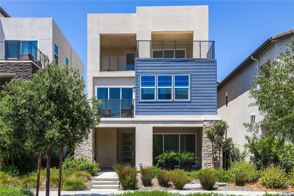 139 Rondo Irvine, CA 92618 - Photo 1 of 1 The front of this modern fully detached home full of up-to-date technologies including EV charger and paid solar panel for low electricity bills. 10 minutes walk to Portola High School.