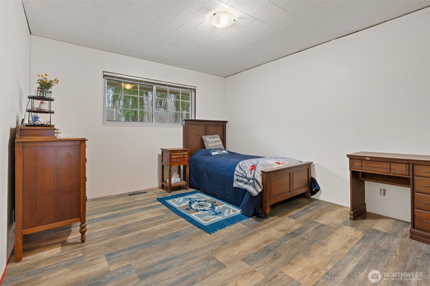 451 Elk Creek Road Chehalis, WA 98532 - Photo 9 of 31 a living room with furniture and a wooden floor