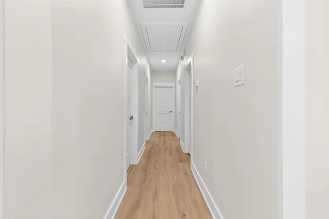 a view of entryway with wooden floor