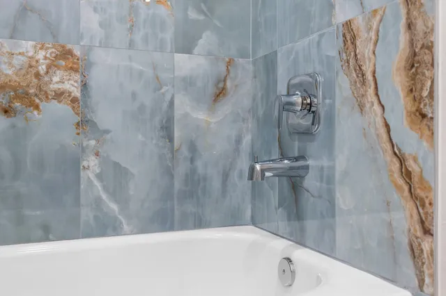 a bathroom with a bathtub