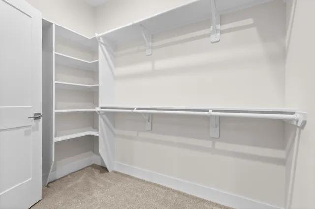 a view of an empty walk in closet