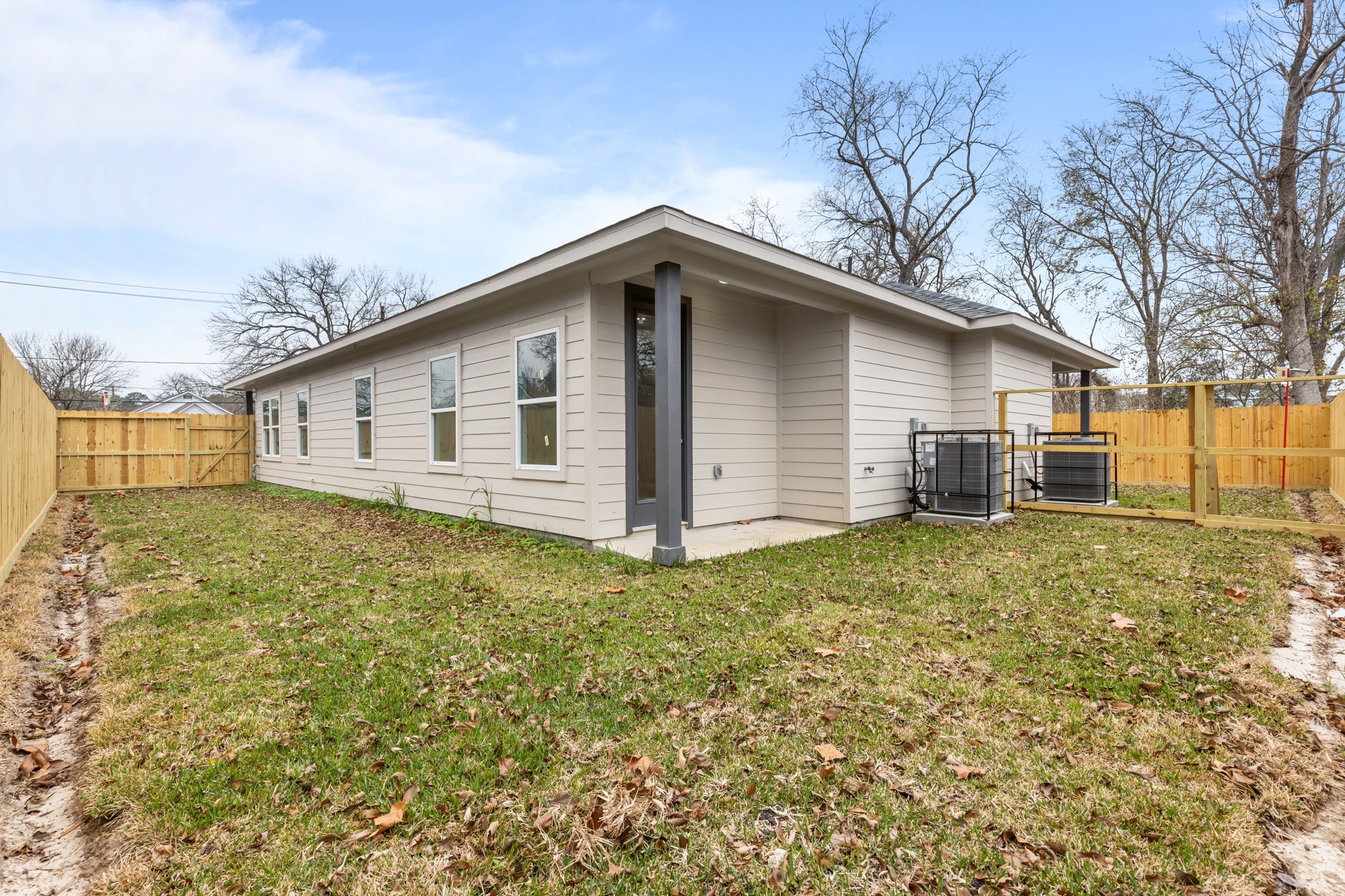 7322 Phillips Street Houston, TX 77088 - Photo 26 of 27 a view of a house with a yard