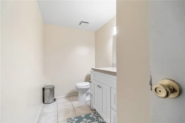 a bathroom with a toilet and a sink