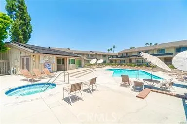 a view of a house with backyard porch and patio