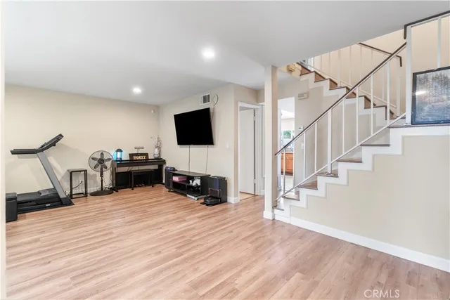 a view of livingroom with furniture and a flat screen tv