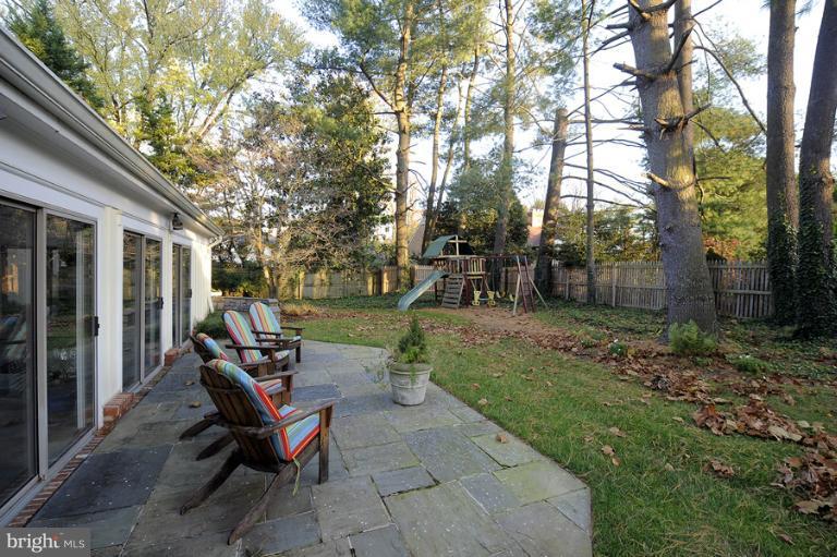 7720 Greentree Road Bethesda, MD 20817 - Photo 13 of 23 a view of a outdoor space with a backyard and sitting area