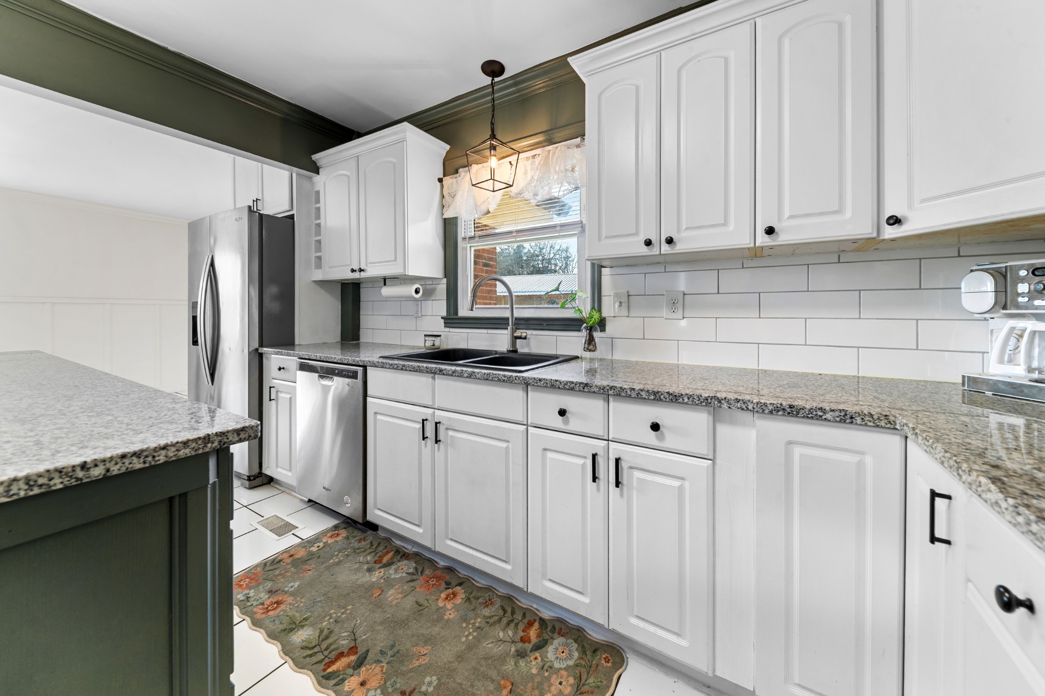 2318 Verona Caney Road Lewisburg, TN 37091 - Photo 19 of 70 a kitchen with granite countertop a sink stainless steel appliances and cabinets