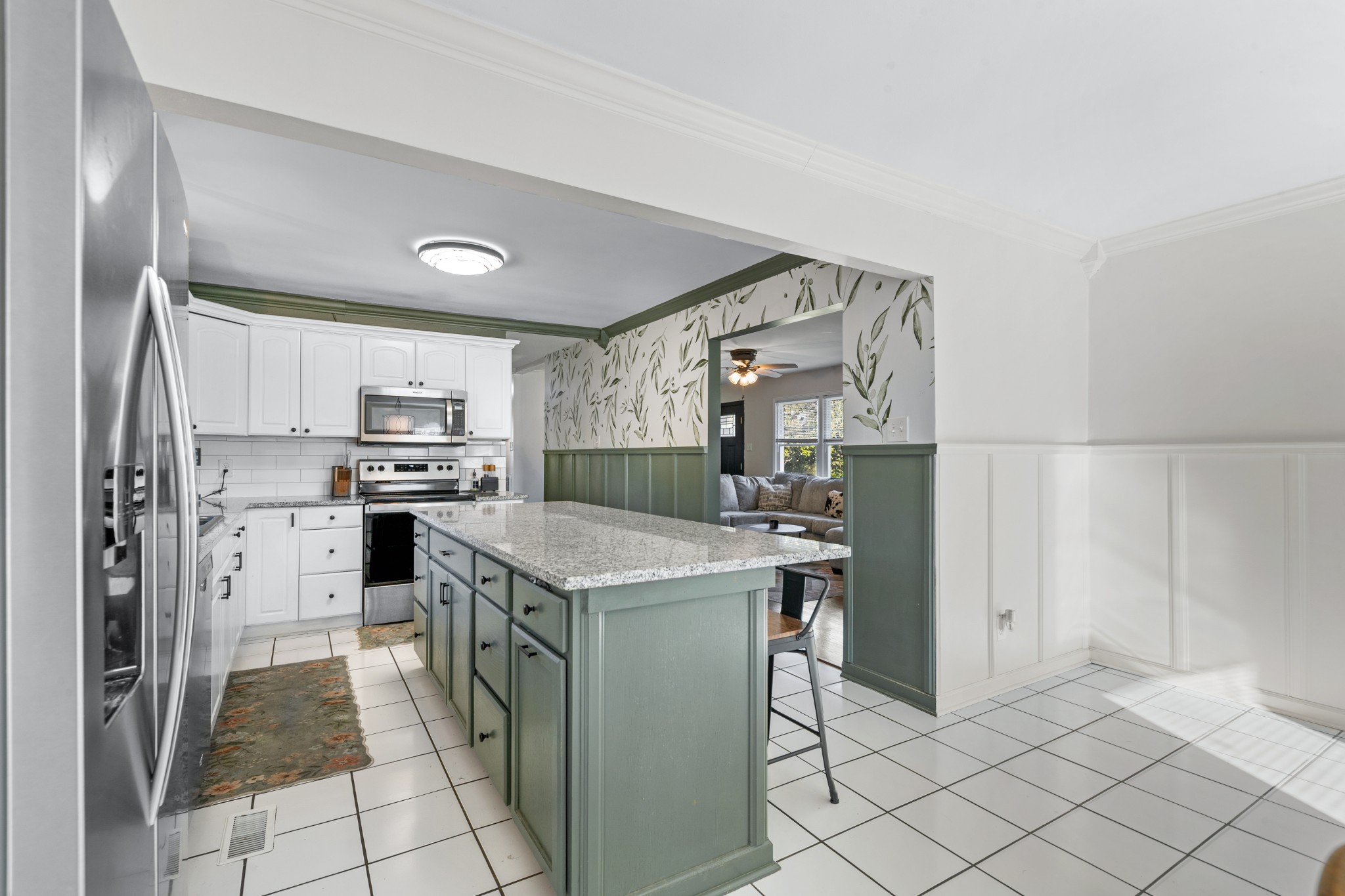 2318 Verona Caney Road Lewisburg, TN 37091 - Photo 25 of 70 a kitchen with stainless steel appliances a stove refrigerator sink and cabinets