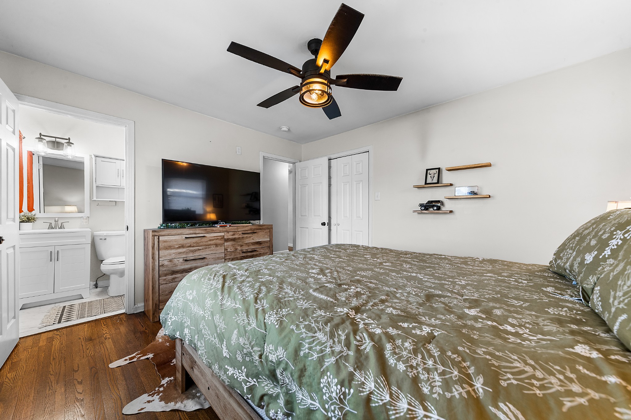 2318 Verona Caney Road Lewisburg, TN 37091 - Photo 35 of 70 a bedroom with a bed and a flat screen tv