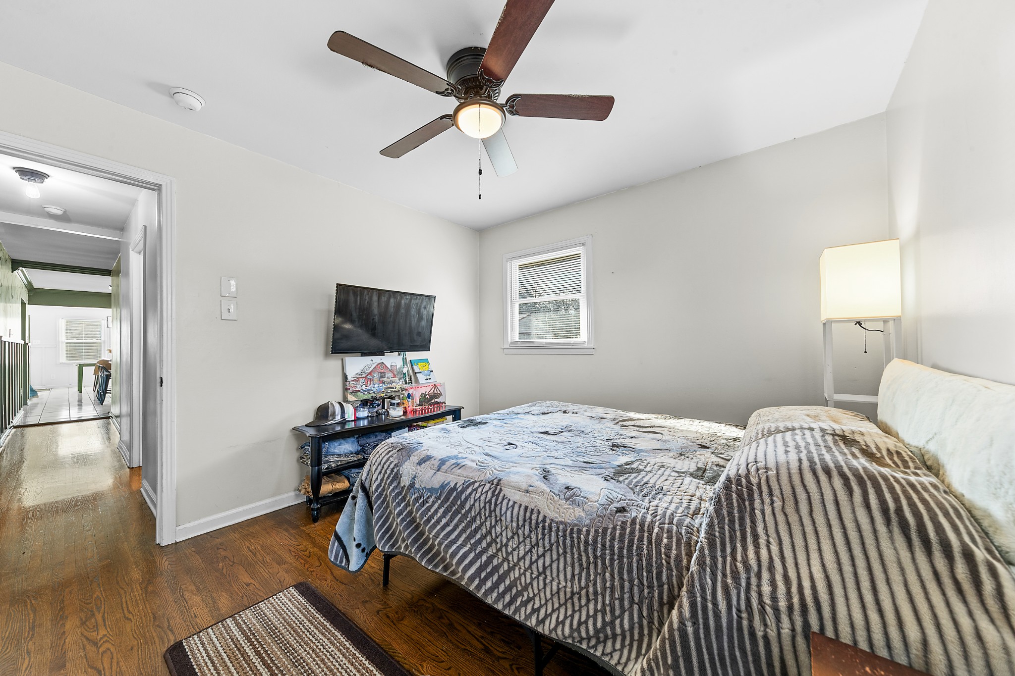 2318 Verona Caney Road Lewisburg, TN 37091 - Photo 40 of 70 a bedroom with a bed and a flat screen tv