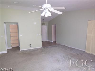 8376 Matanzas Road Fort Myers, FL 33967 - Photo 4 of 10 a view of a chandelier fan and a chandelier fan in a room