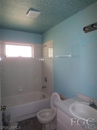 8376 Matanzas Road Fort Myers, FL 33967 - Photo 7 of 10 a bathroom with a sink toilet and shower