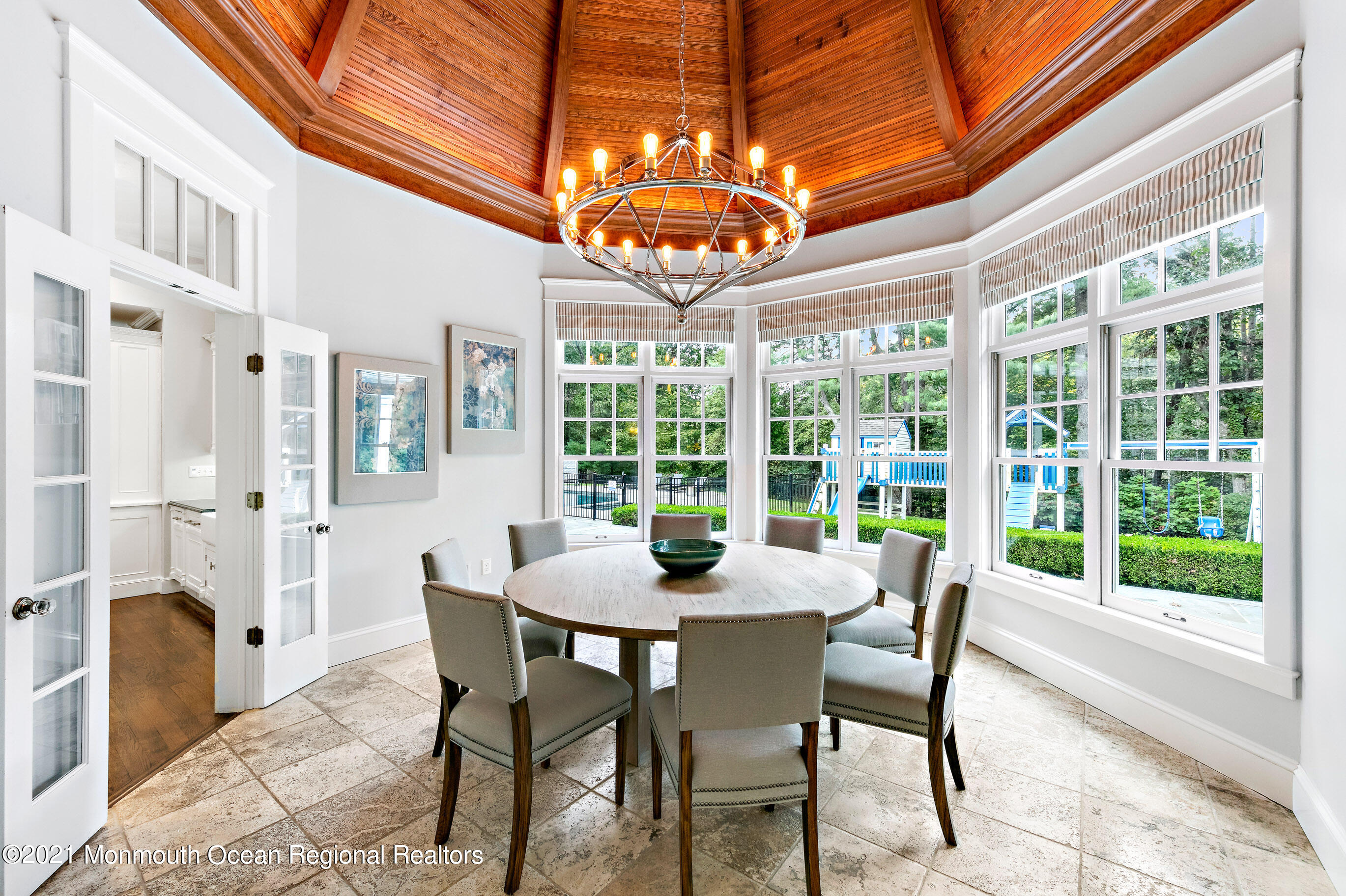 43 Muhlenbrink Road Colts Neck, NJ 07722 - Photo 15 of 89 a dining room with furniture a chandelier and large window
