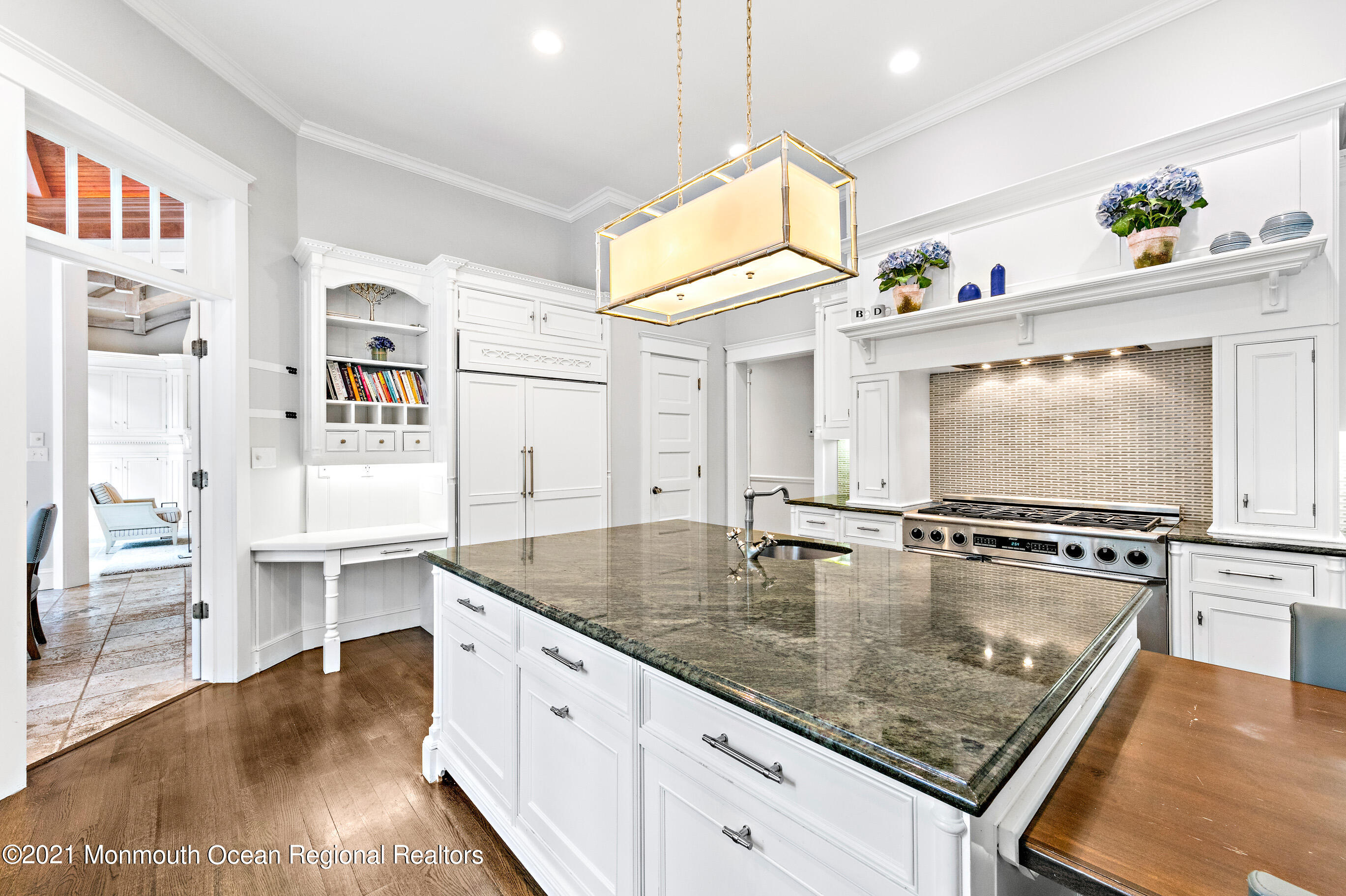 43 Muhlenbrink Road Colts Neck, NJ 07722 - Photo 20 of 89 a kitchen with stainless steel appliances granite countertop a sink dishwasher and stove with wooden floor