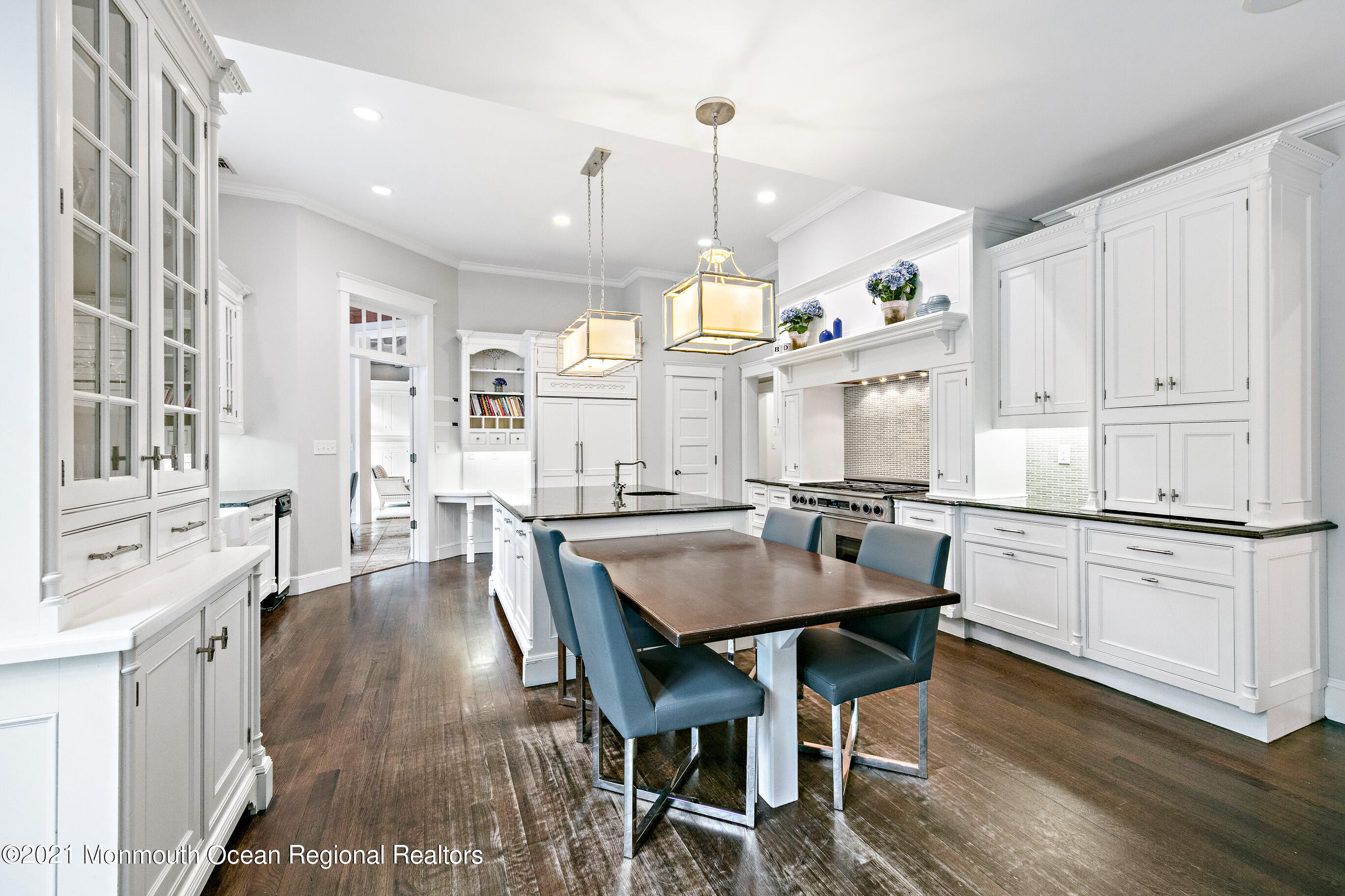 43 Muhlenbrink Road Colts Neck, NJ 07722 - Photo 22 of 89 a kitchen with stainless steel appliances white cabinets and wooden floor