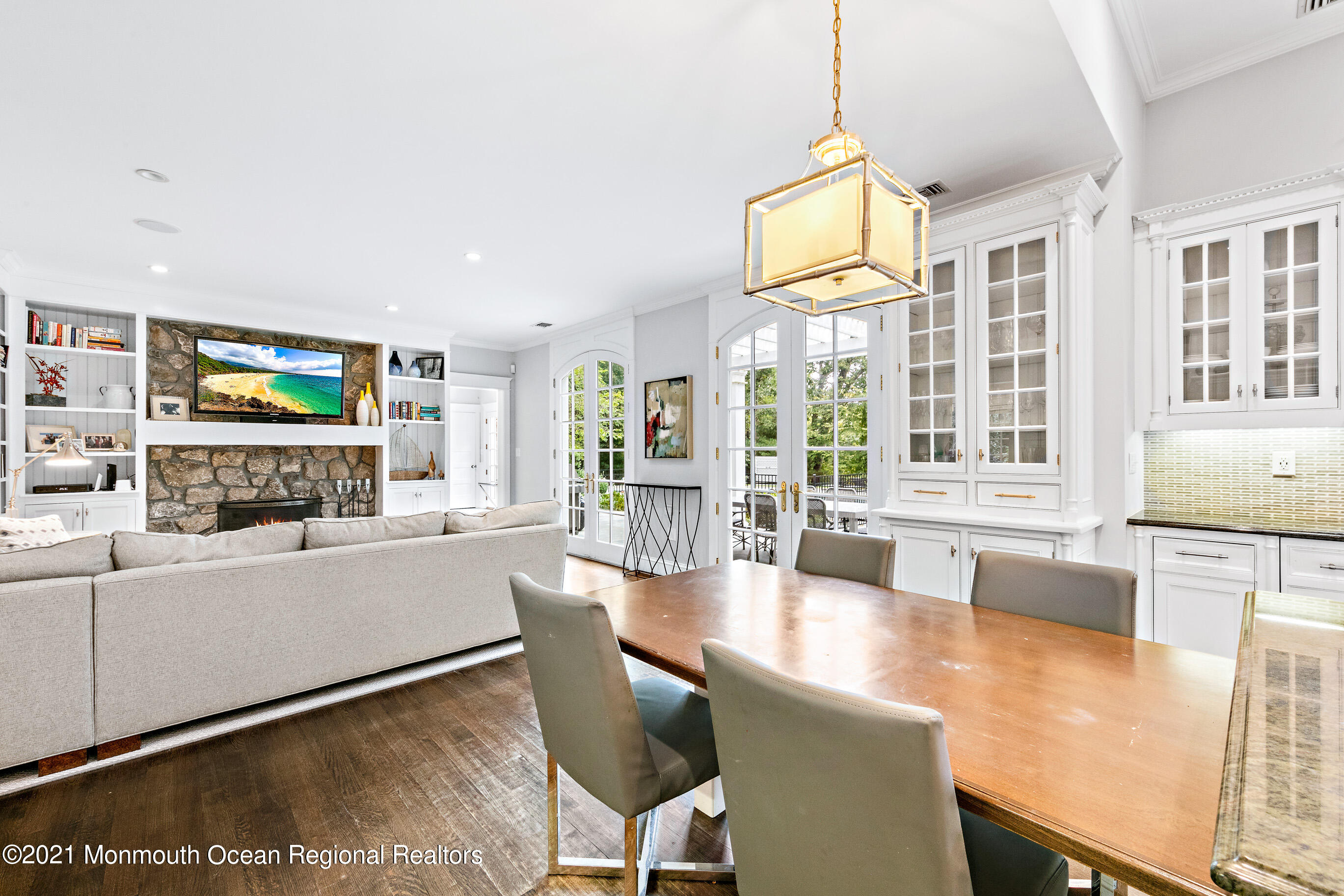 43 Muhlenbrink Road Colts Neck, NJ 07722 - Photo 23 of 89 a living room with fireplace furniture and a flat screen tv
