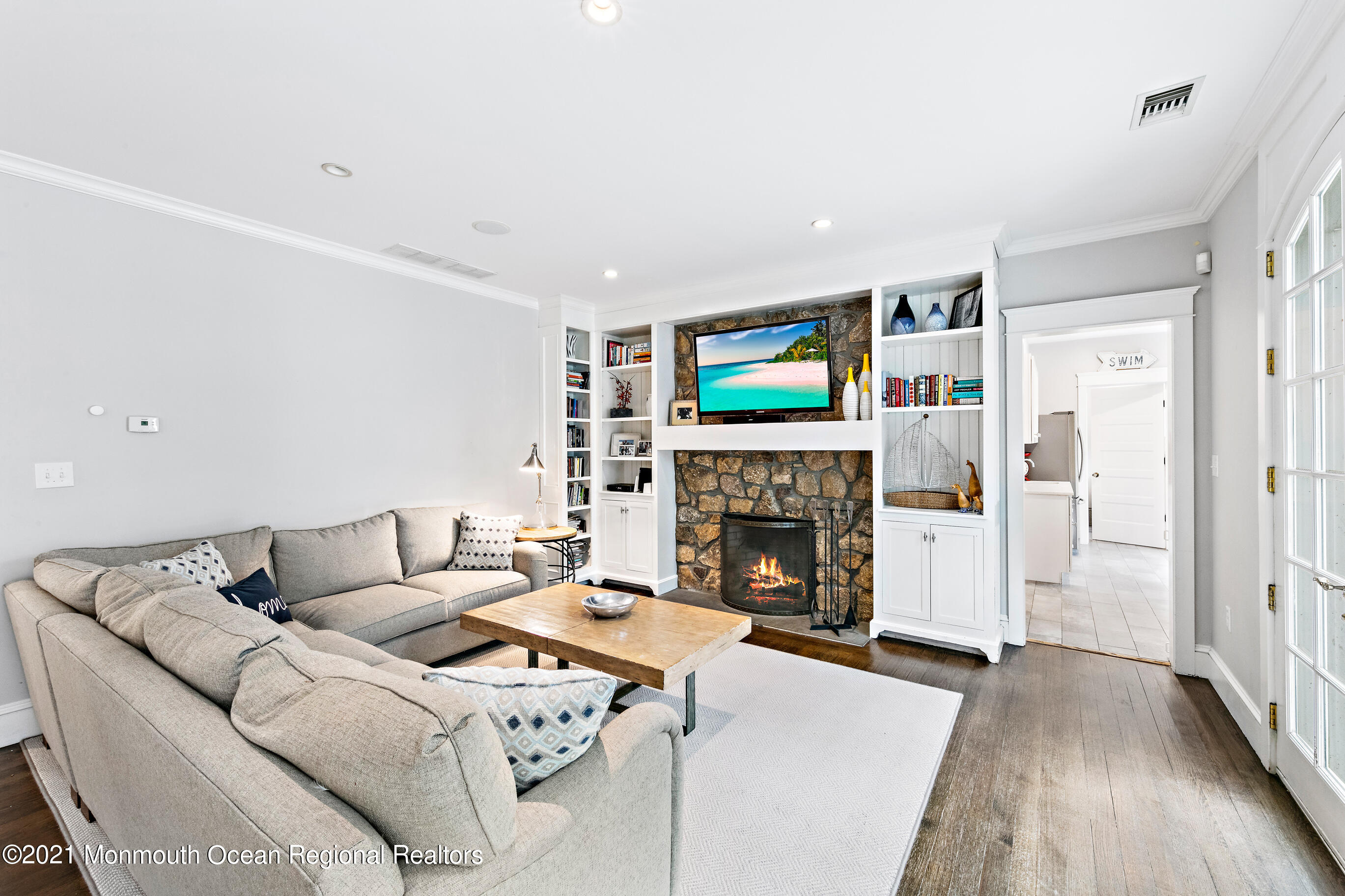 43 Muhlenbrink Road Colts Neck, NJ 07722 - Photo 26 of 89 a living room with furniture and a fireplace