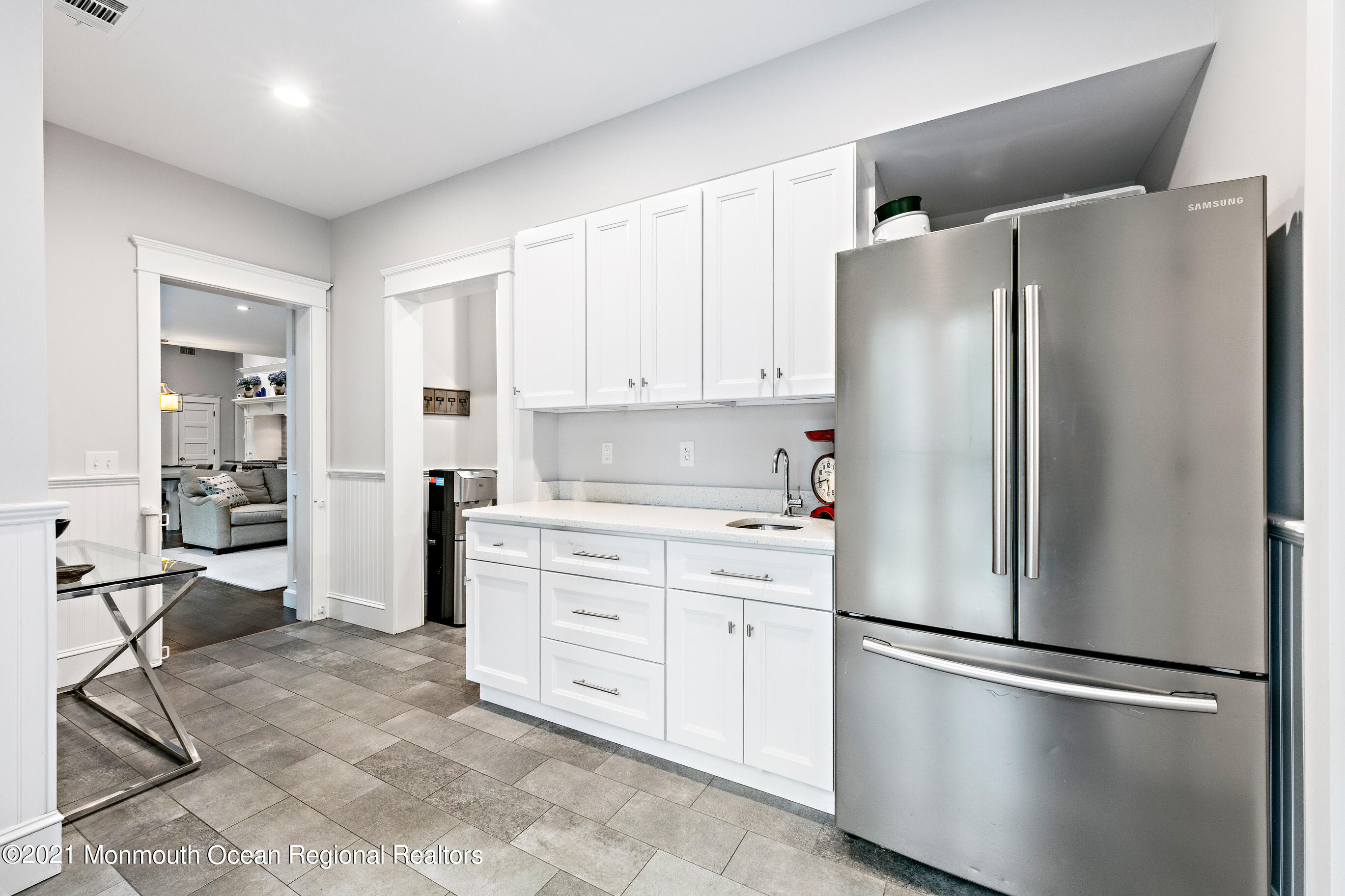 43 Muhlenbrink Road Colts Neck, NJ 07722 - Photo 28 of 89 a kitchen with stainless steel appliances a refrigerator sink and cabinets