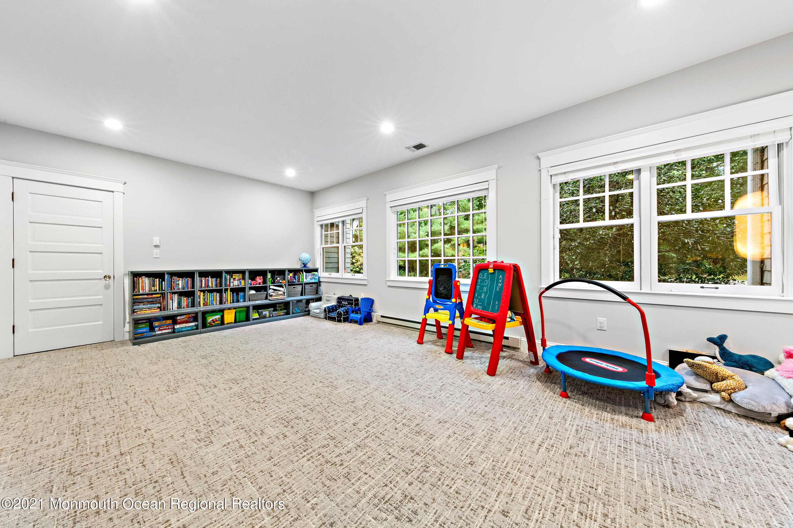 43 Muhlenbrink Road Colts Neck, NJ 07722 - Photo 32 of 89 a very nice looking room with a large window and gym equipment