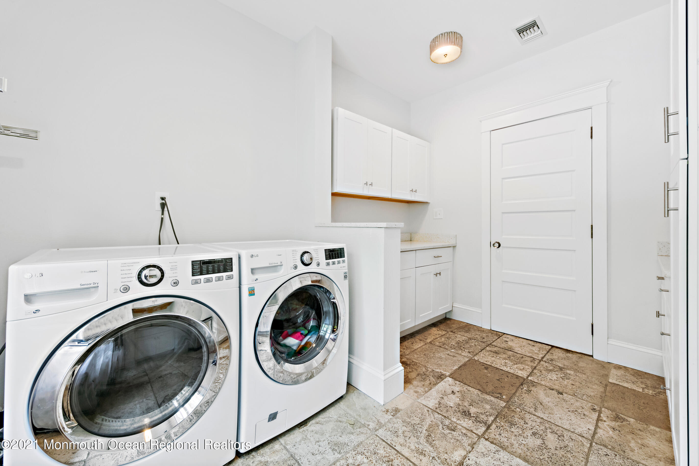 43 Muhlenbrink Road Colts Neck, NJ 07722 - Photo 35 of 89 a view of entryway with washer and dryer