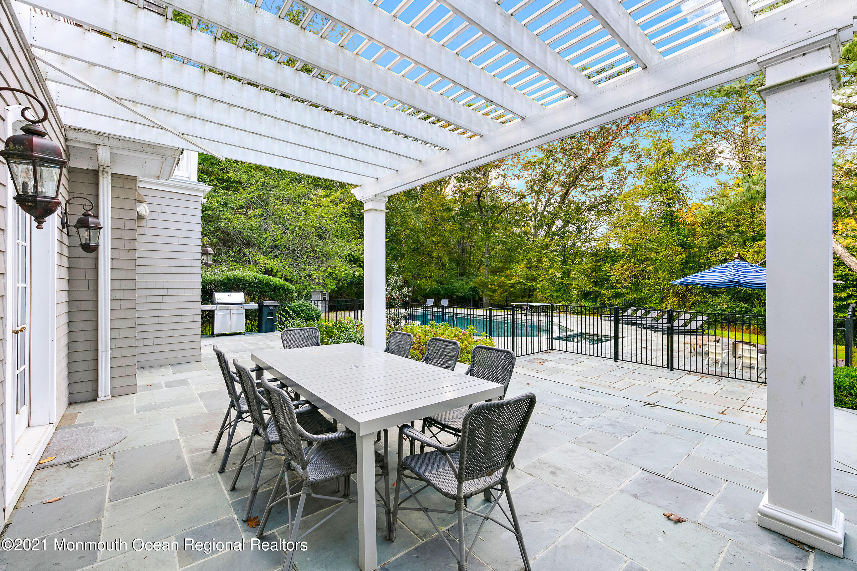 43 Muhlenbrink Road Colts Neck, NJ 07722 - Photo 76 of 89 a view of a patio with a backyard
