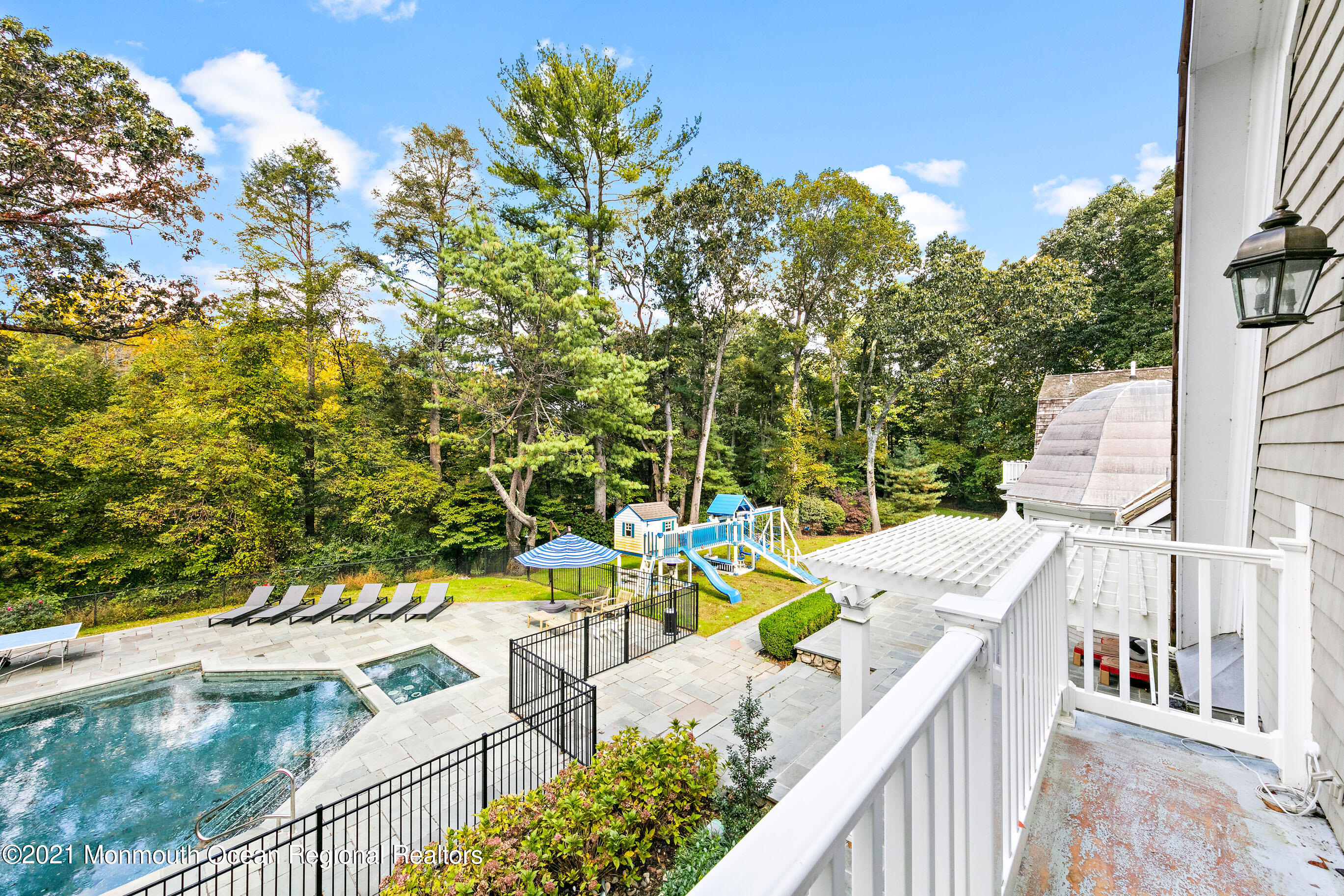 43 Muhlenbrink Road Colts Neck, NJ 07722 - Photo 81 of 89 a view of a balcony with two chairs