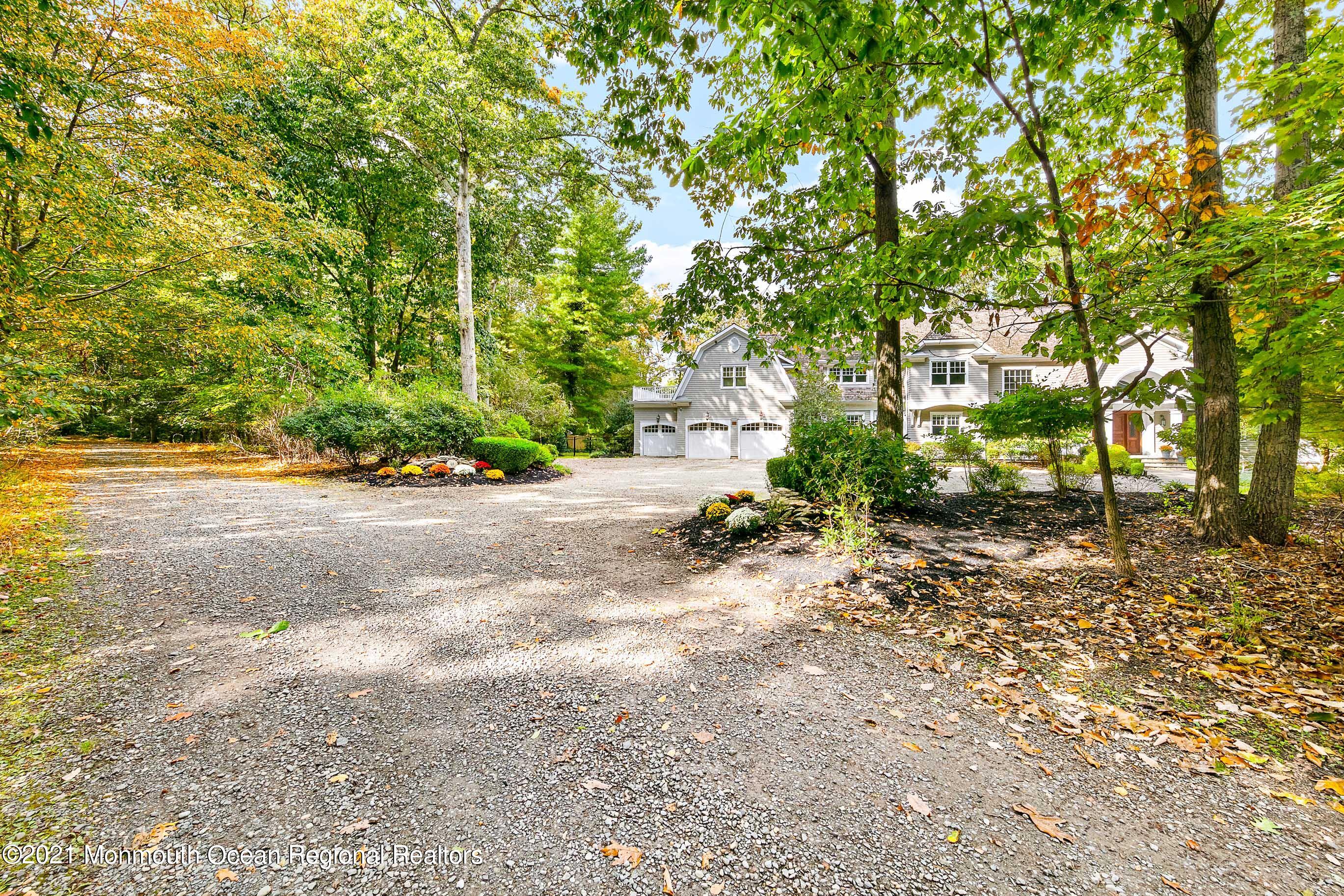 43 Muhlenbrink Road Colts Neck, NJ 07722 - Photo 89 of 89 a view of a yard with plants and trees