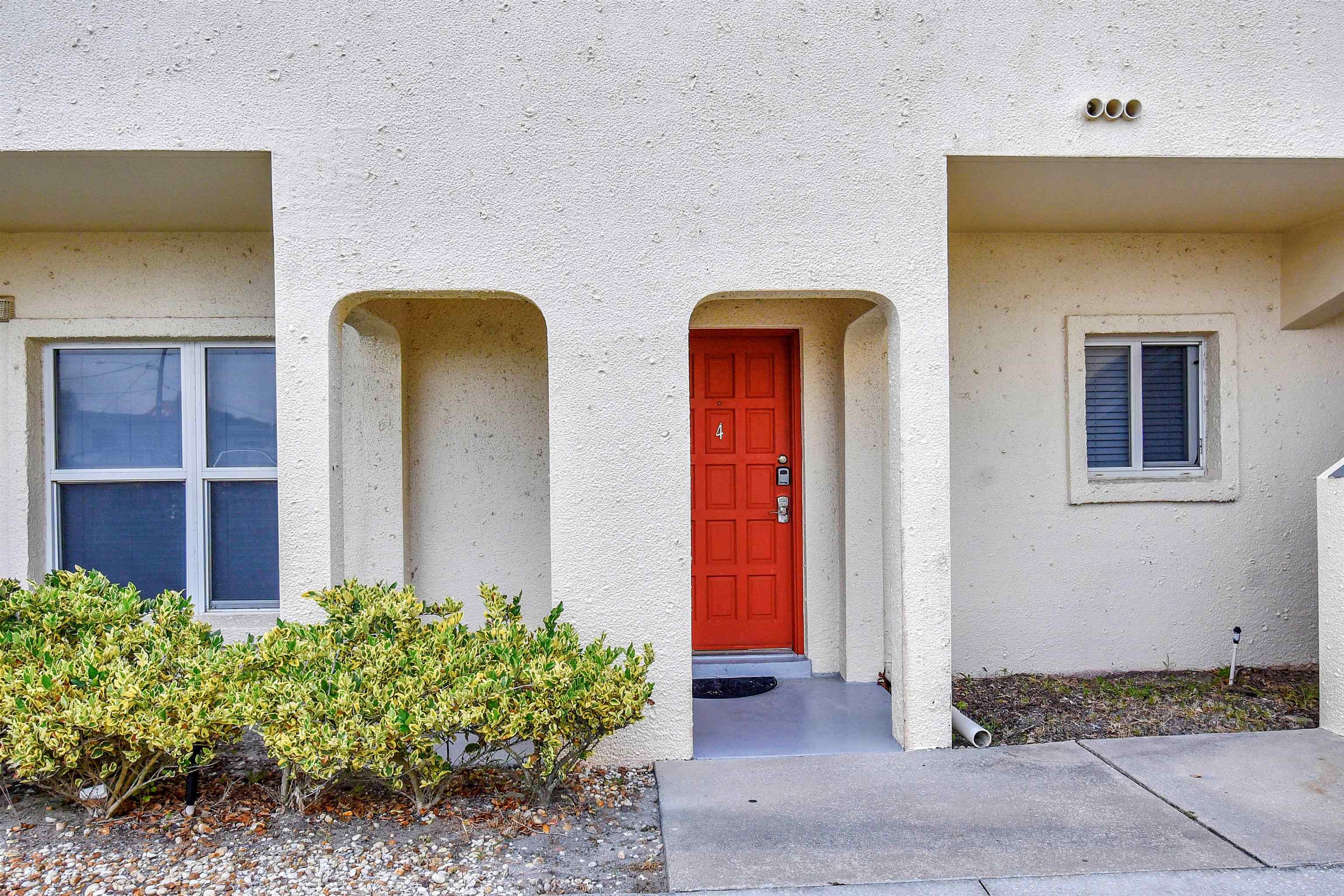 390 A1A Beach Boulevard, Unit 4 St. Augustine Beach, FL 32080 - Photo 21 of 34 a front view of house with yard