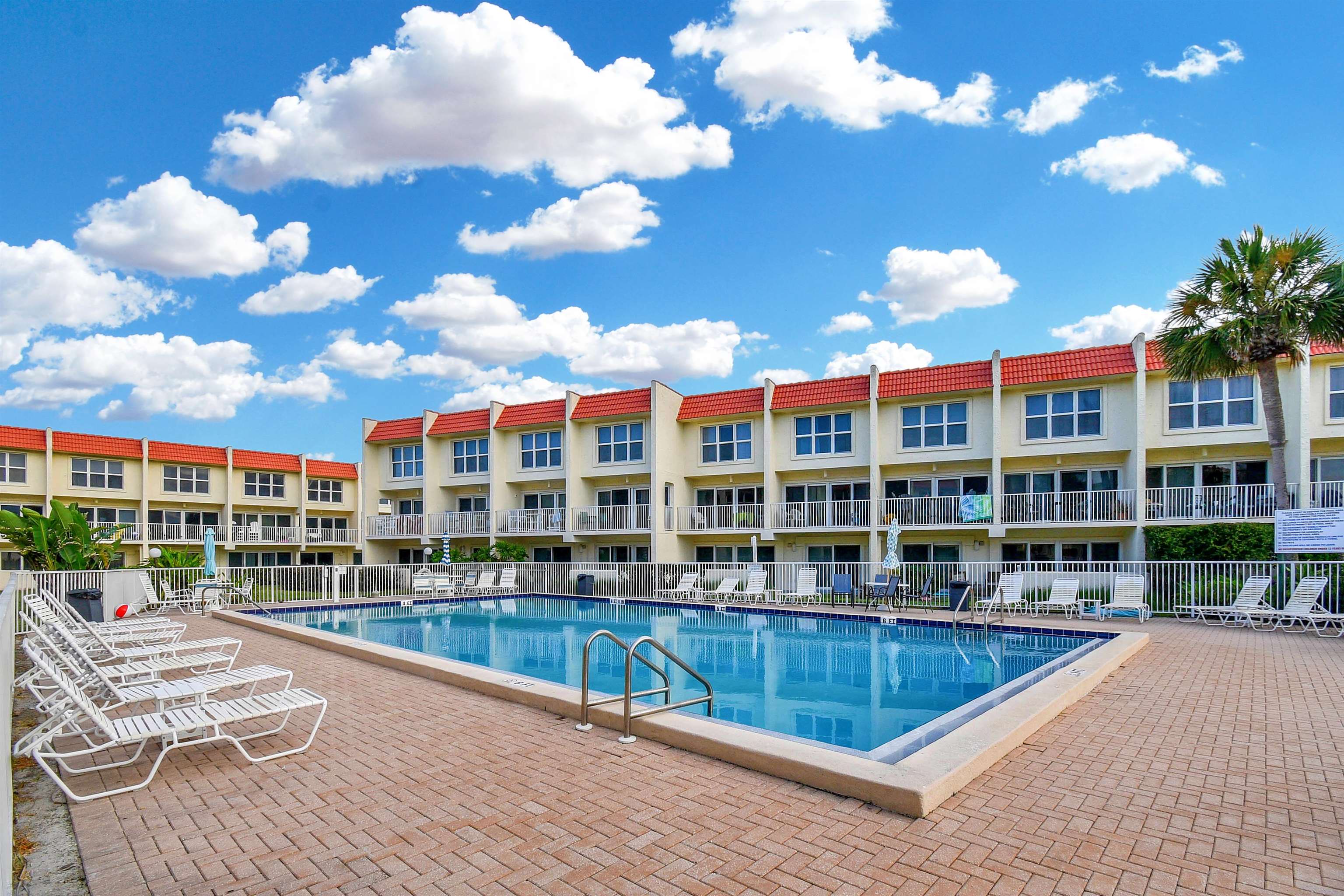 390 A1A Beach Boulevard, Unit 4 St. Augustine Beach, FL 32080 - Photo 26 of 34 a view of swimming pool with outdoor seating and city view