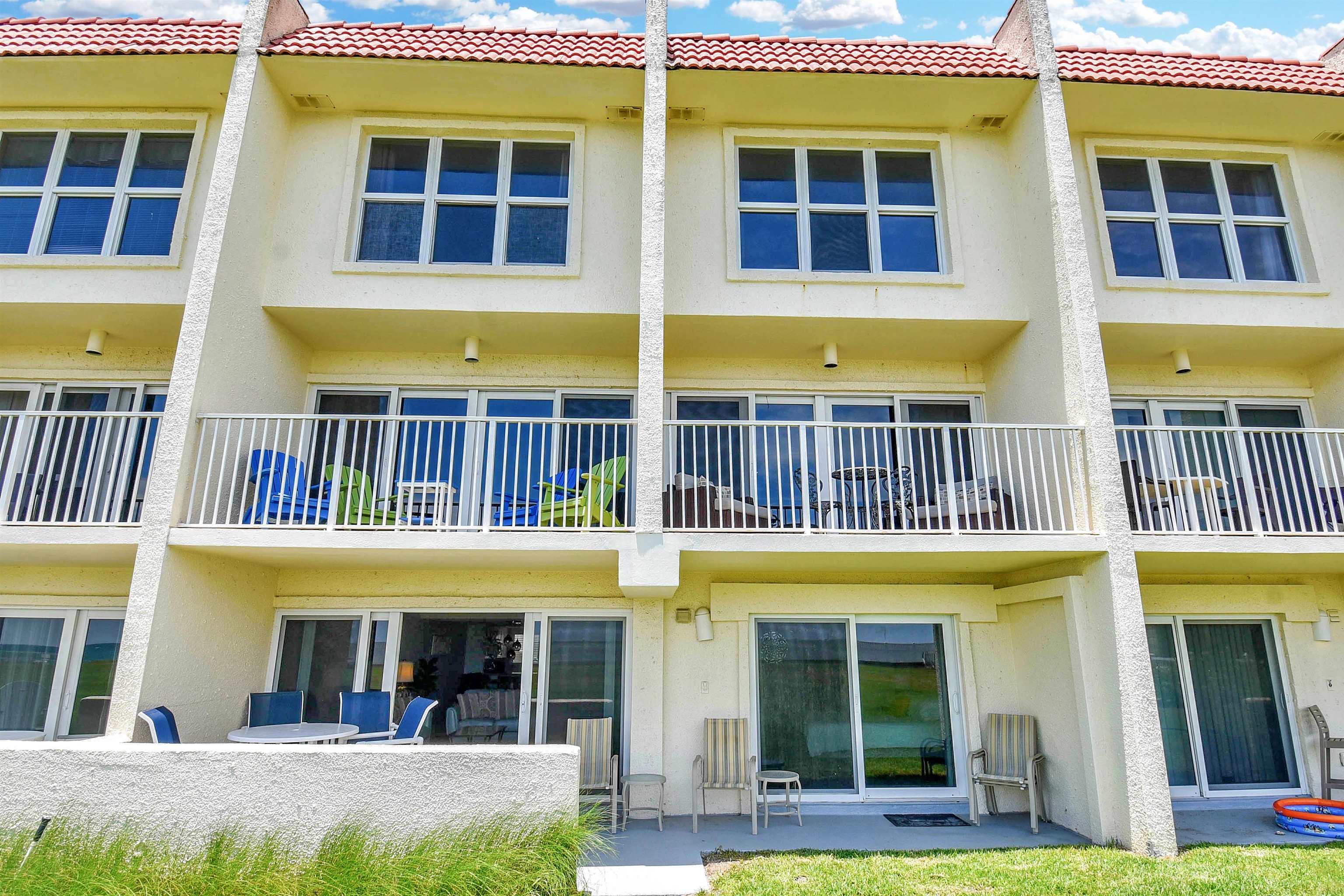 390 A1A Beach Boulevard, Unit 4 St. Augustine Beach, FL 32080 - Photo 33 of 34 a view of a building with a swimming pool