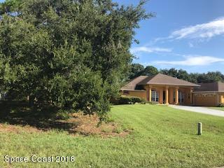 301 Lanack Road Southeast Palm Bay, FL 32909 - Photo 3 of 4 301 Lanack Rd next door