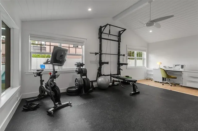 a bathroom with a shower and a toilet