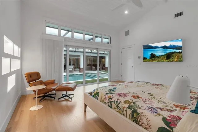 a spacious bathroom with a sink a toilet and a mirror
