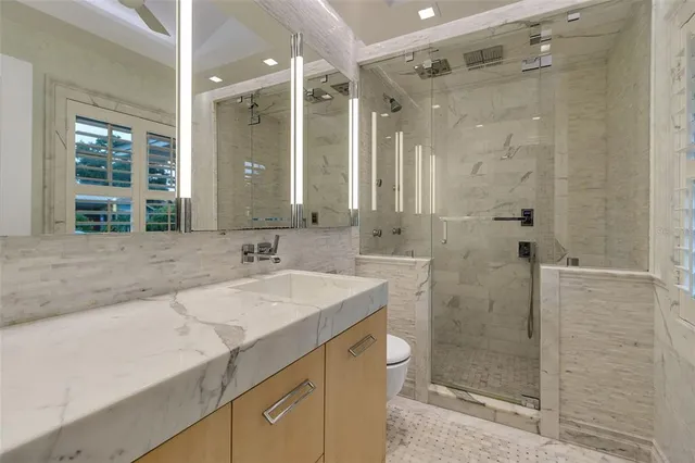 a balcony with furniture and wooden floor