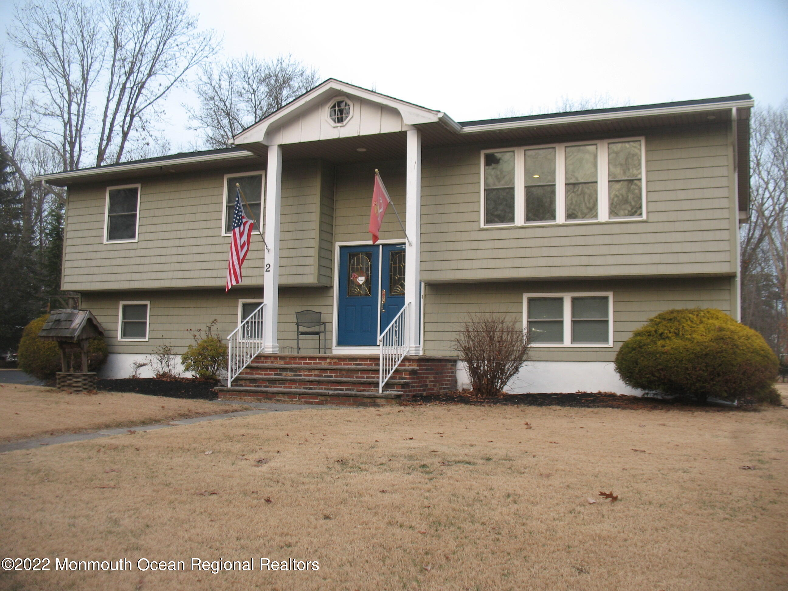 2 Godell Drive Howell, NJ 07731 - Photo 1 of 35 a front view of a house with a yard