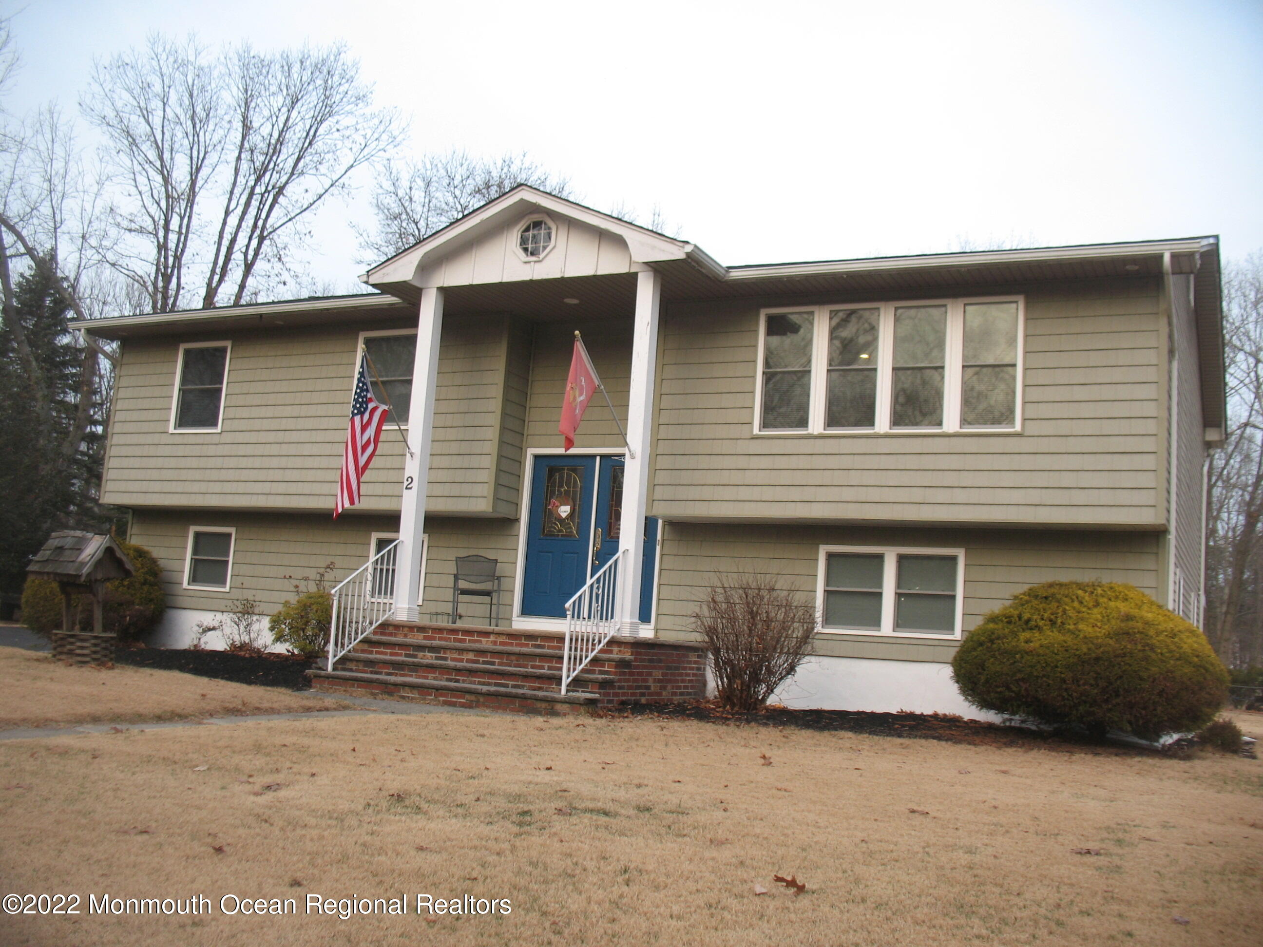 2 Godell Drive Howell, NJ 07731 - Photo 2 of 35 a front view of a house with a garage