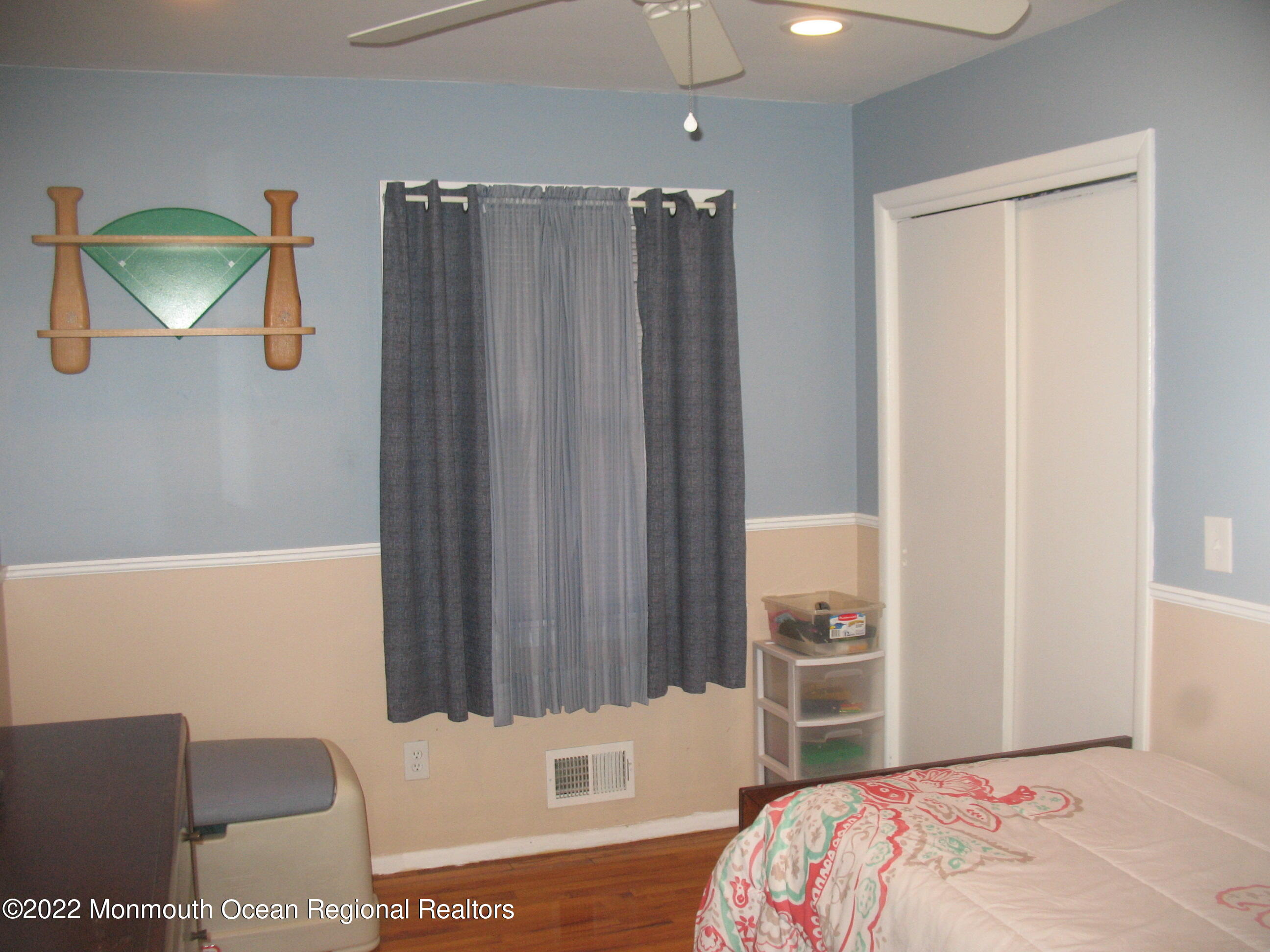 2 Godell Drive Howell, NJ 07731 - Photo 23 of 35 a bedroom with a bed and a chair