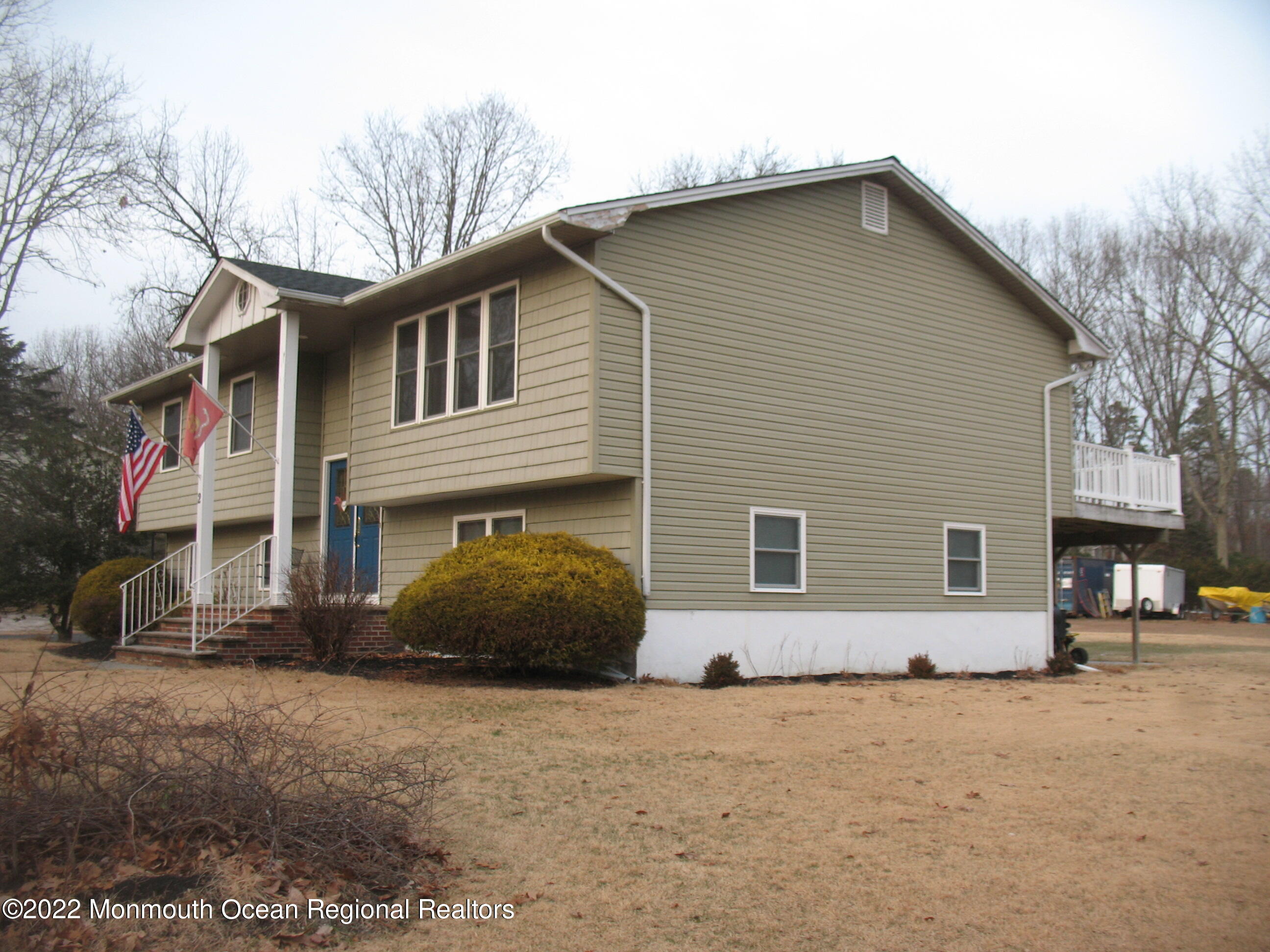 2 Godell Drive Howell, NJ 07731 - Photo 4 of 35 a front view of a house with a yard